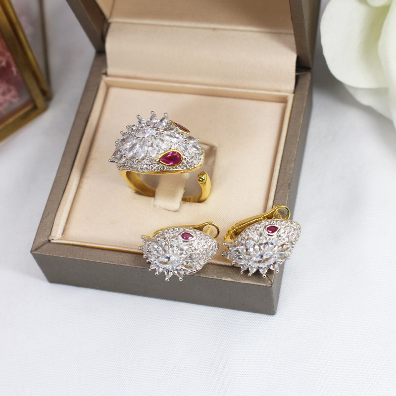 Snake shaped electroplated micro horseeye zircon ring