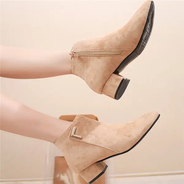 Pointed toe and low heel boots