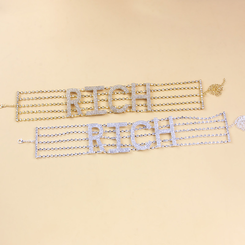 The necklace was covered with RICH letters