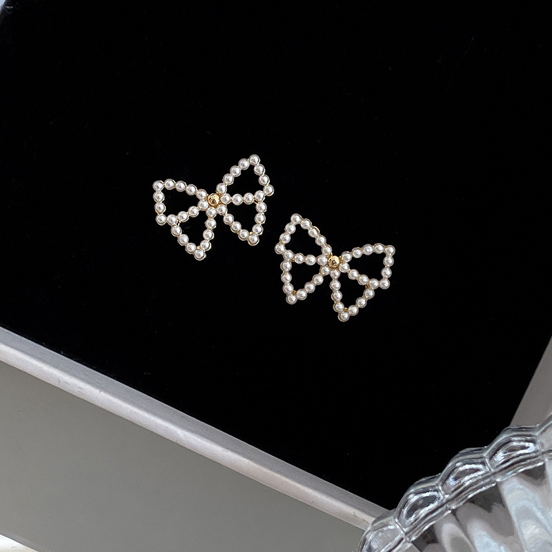 Sterling silver pearl bow earrings simple and delicate