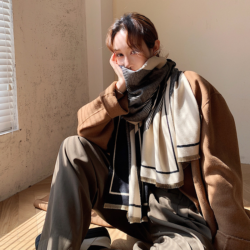 Students wear a shawl outside wool cloak