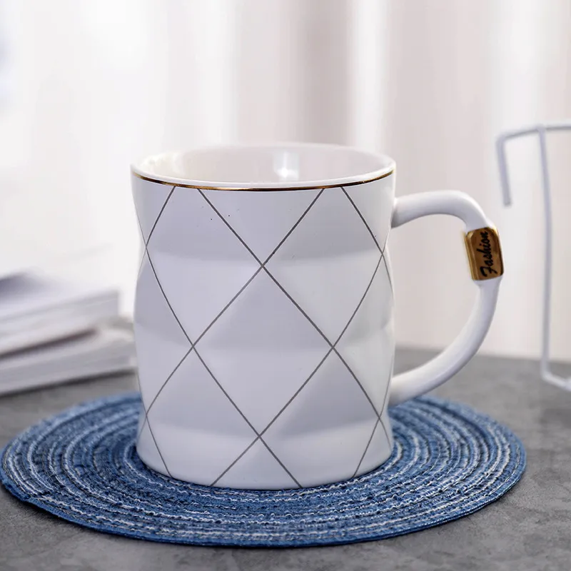 Gold painted black and white lattice ceramic cup - White