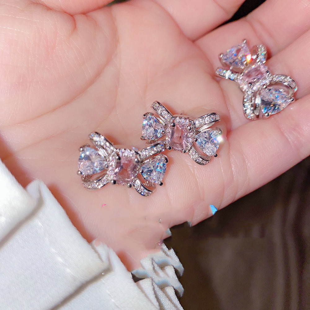 Gentle peach blossom drop zircon bow earrings
