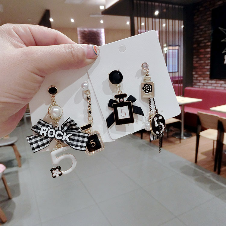 Fringed plaid bow earrings