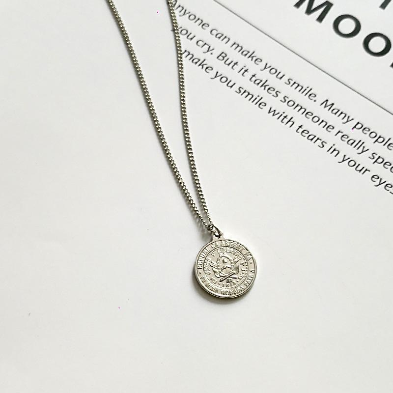 Metal engraved coin necklace