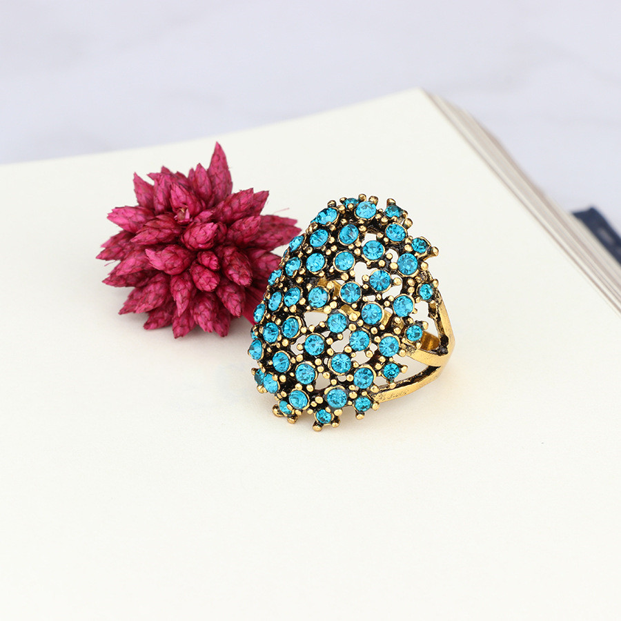 Dense four-prong black diamond ring — view 5