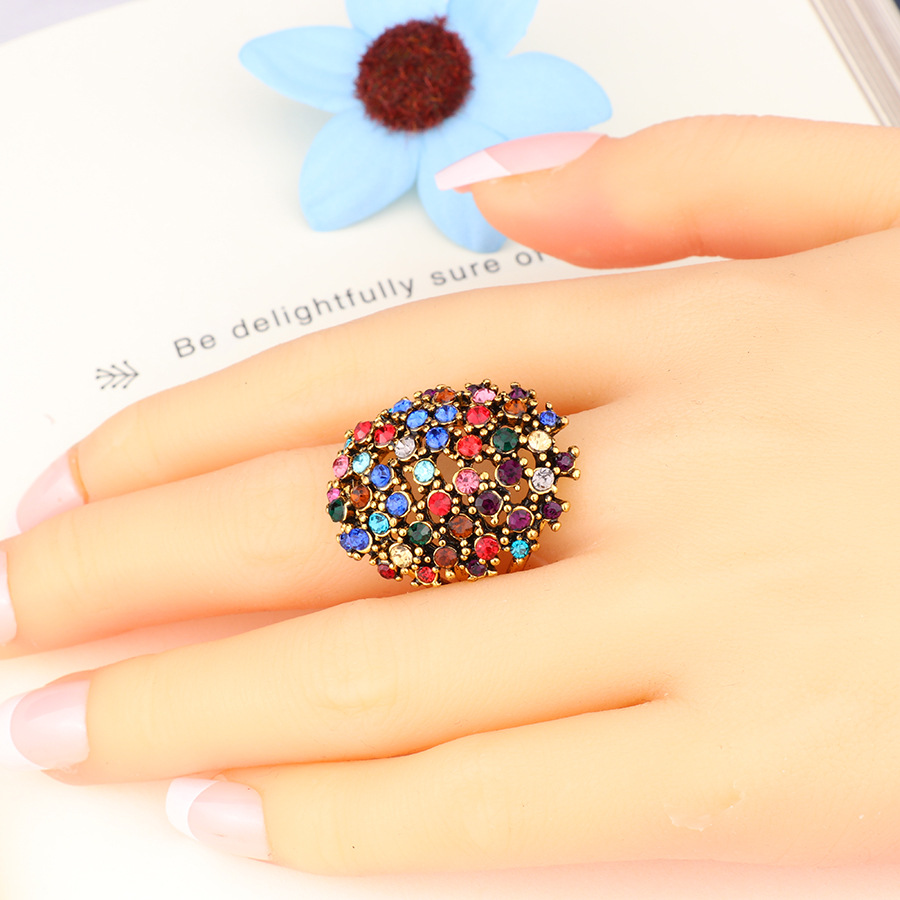 Dense four-prong black diamond ring — view 3
