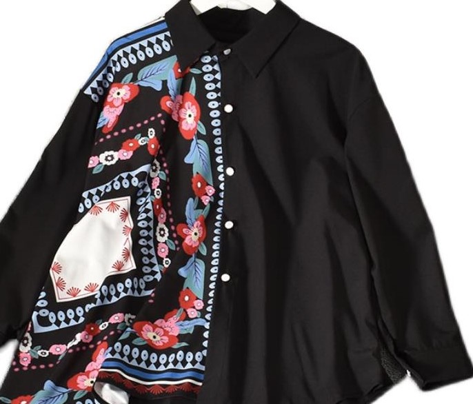 Irregular loose mid length Euramerican versatile top