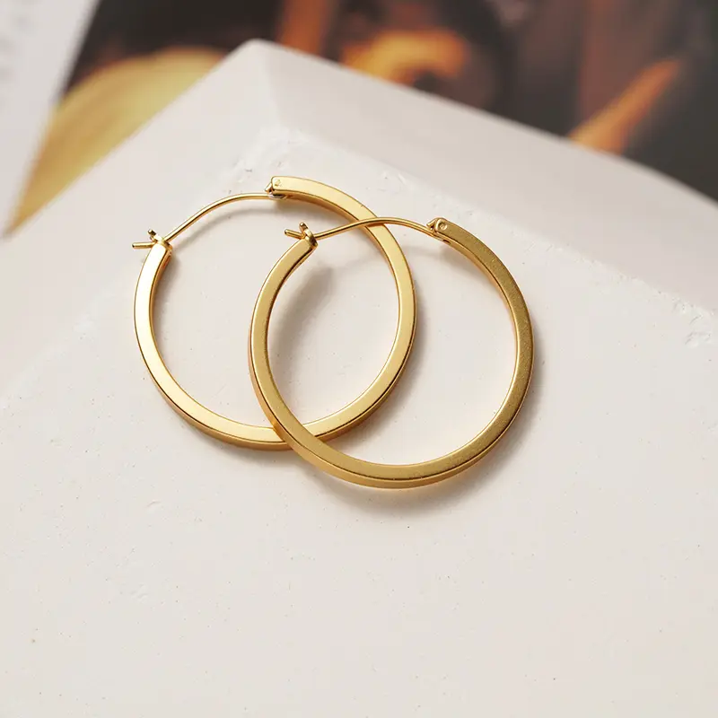 French minimalist circle ear buckle