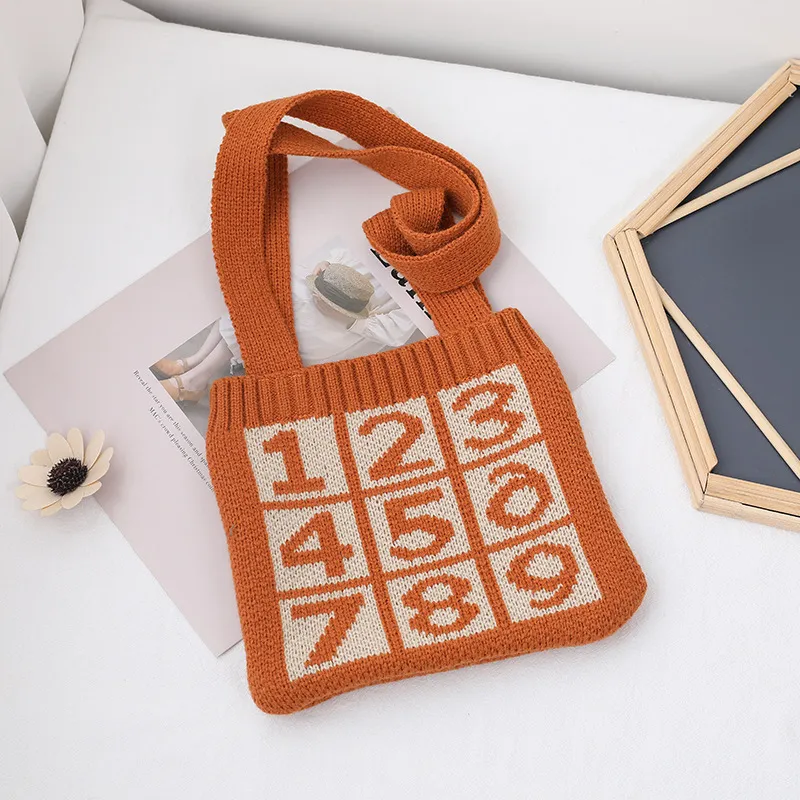 Concave shape diagonal straddle knitted bag - Orange