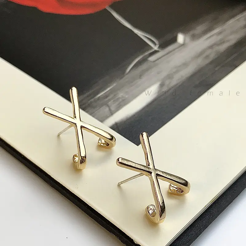 Cross bending fashion temperament earrings European and American French earrings