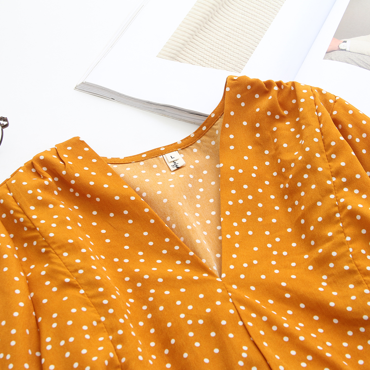 V-neck polka dot streamer long sleeve shirt