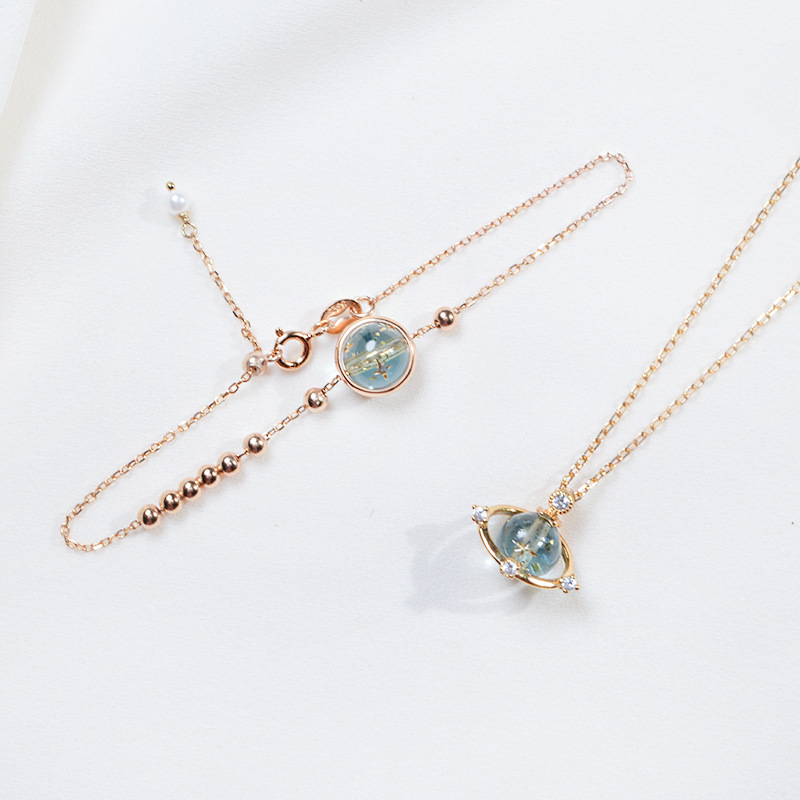Female blue planet universe bracelet
