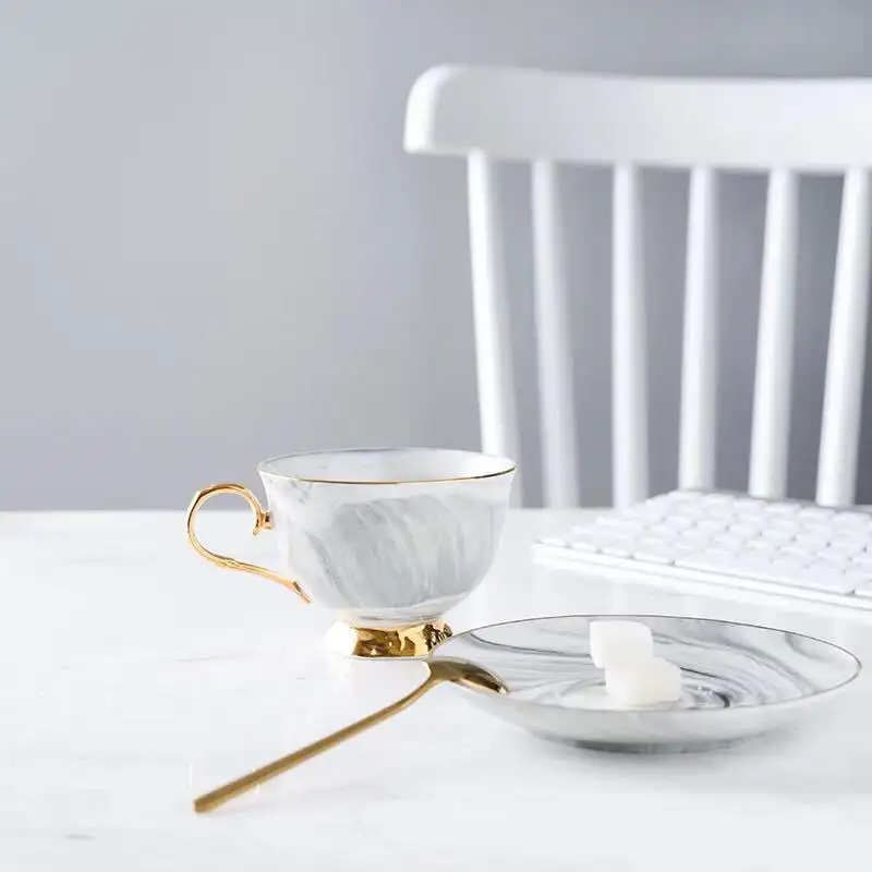 Marbled ceramic coffee cup and saucer