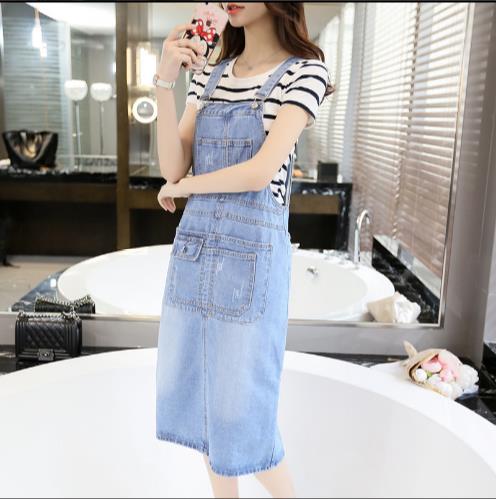 Medium length denim skirt with suspender