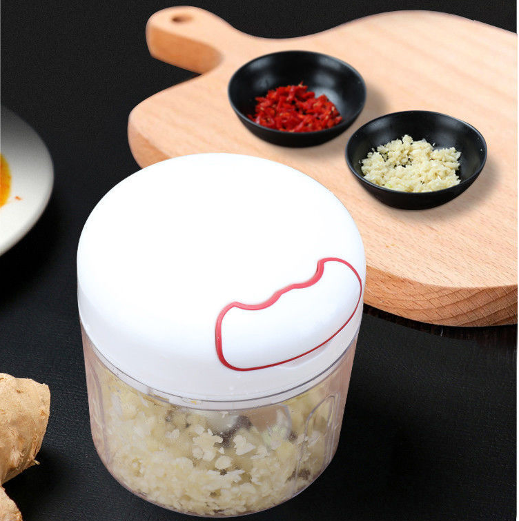 Small cut-and-pull garlic press