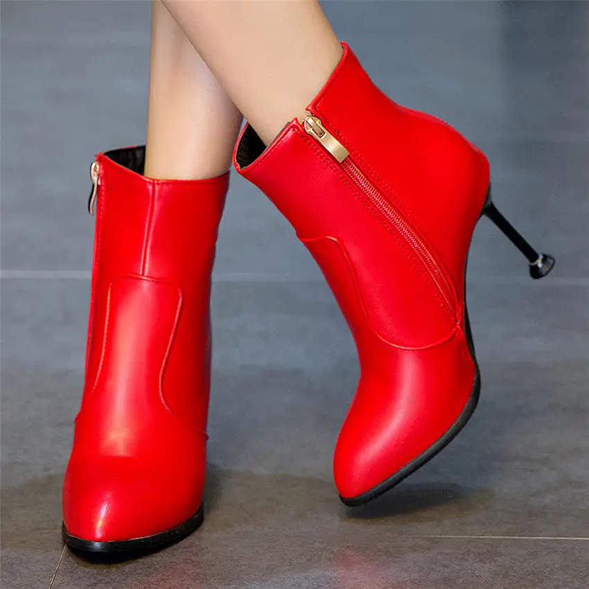 Red women's boots with stiletto heels