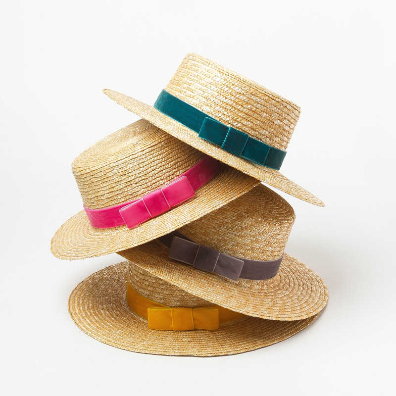 Straw hat with velvet ribbon and flat top