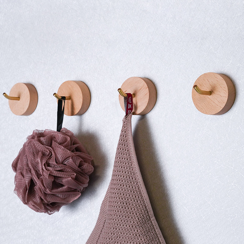Solid wood hook on toilet wall
