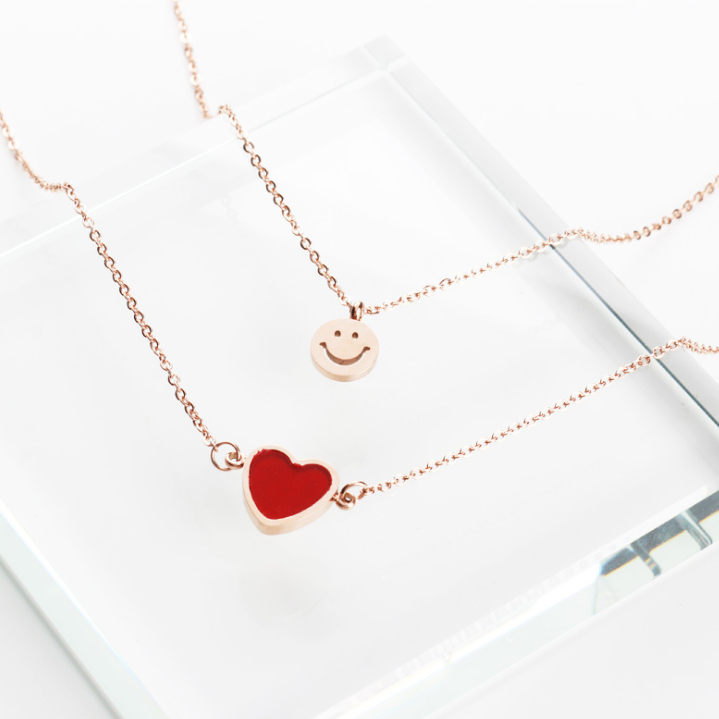 Korean version of the stylish titanium steel rose double love necklace red peach heart clavicle chain female short money ornaments
