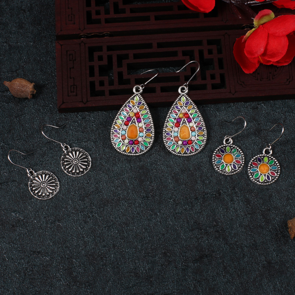Alloy drop oil inlaid rice bead earrings