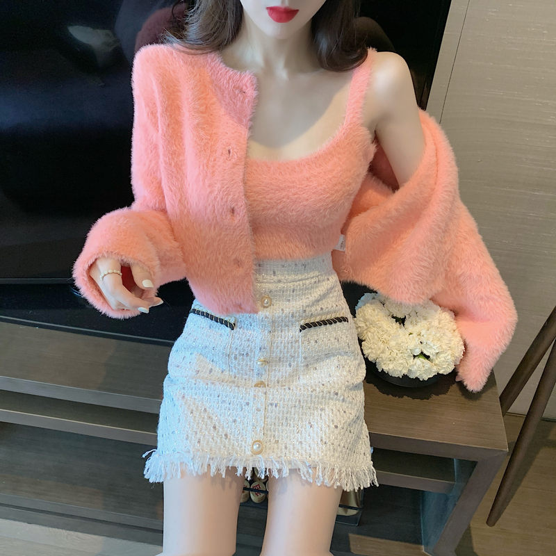 Two-piece suit with hip skirt