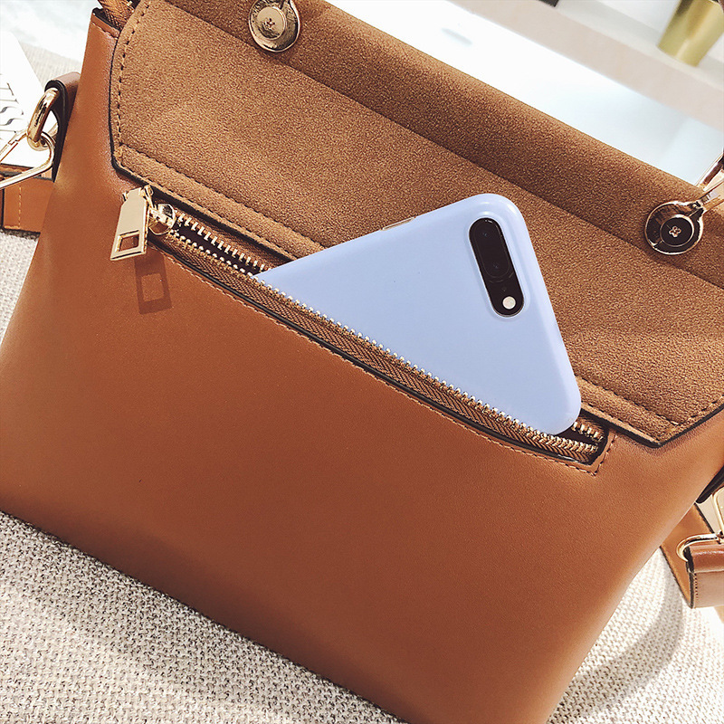 Small square bag with wide shoulder strap and cross-body