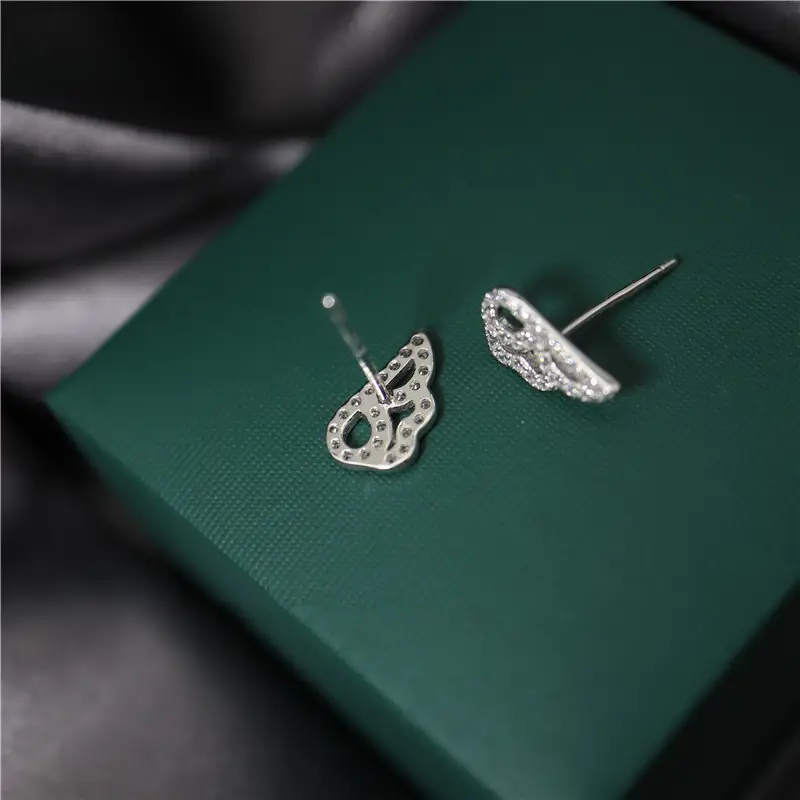 Studded female angel's wings slightly inlaid