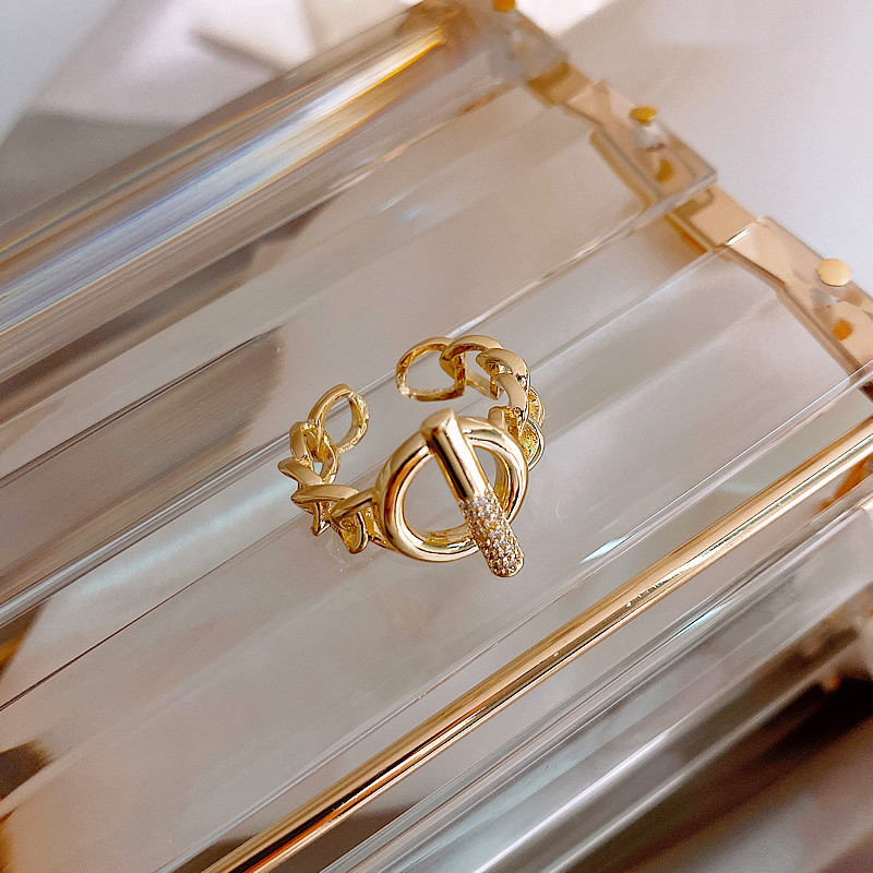 Exaggerated index finger ring lady