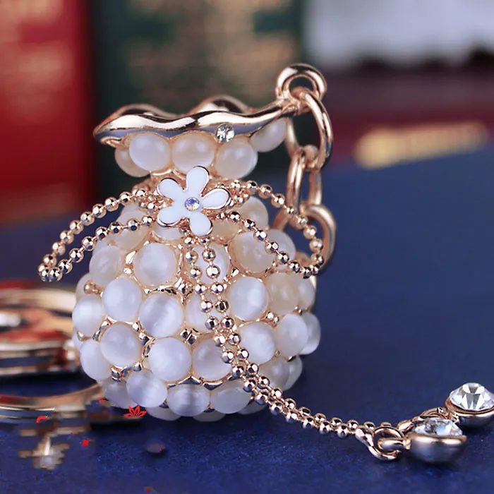 Opal purse with tassel rhinestone keychain - White