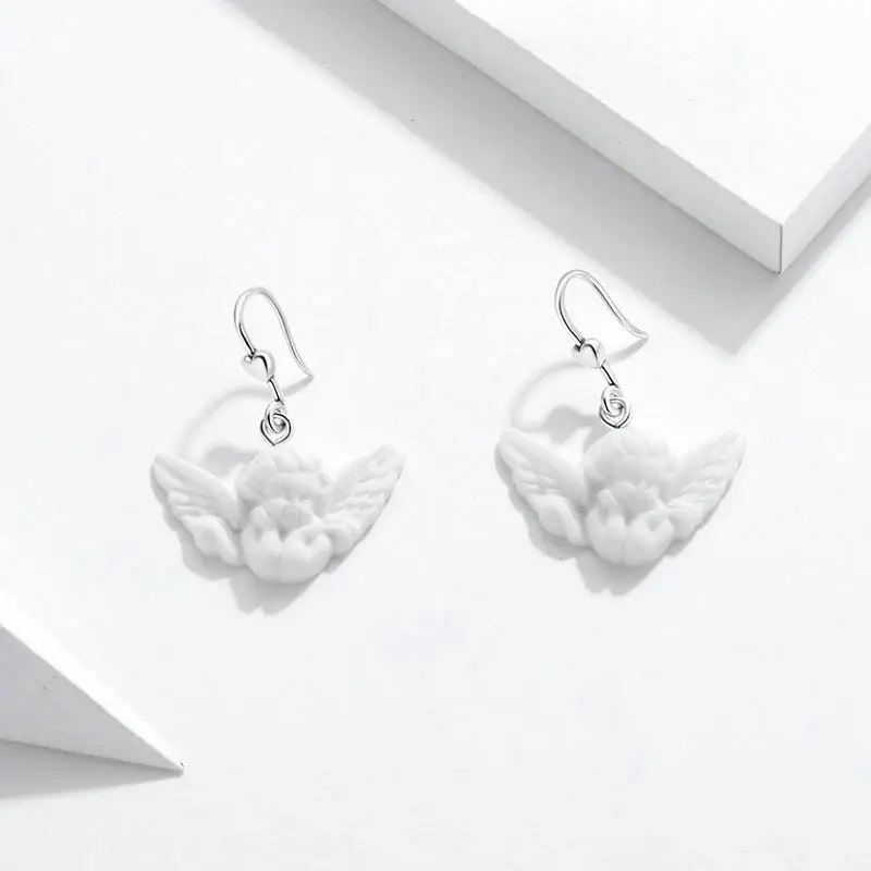 S925 sterling silver angel earrings European and American fashion resin