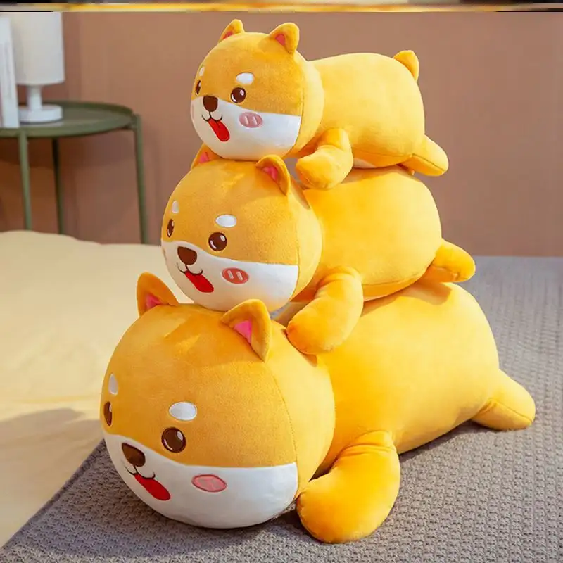 The same type of stuffed toy with a sleeping dog