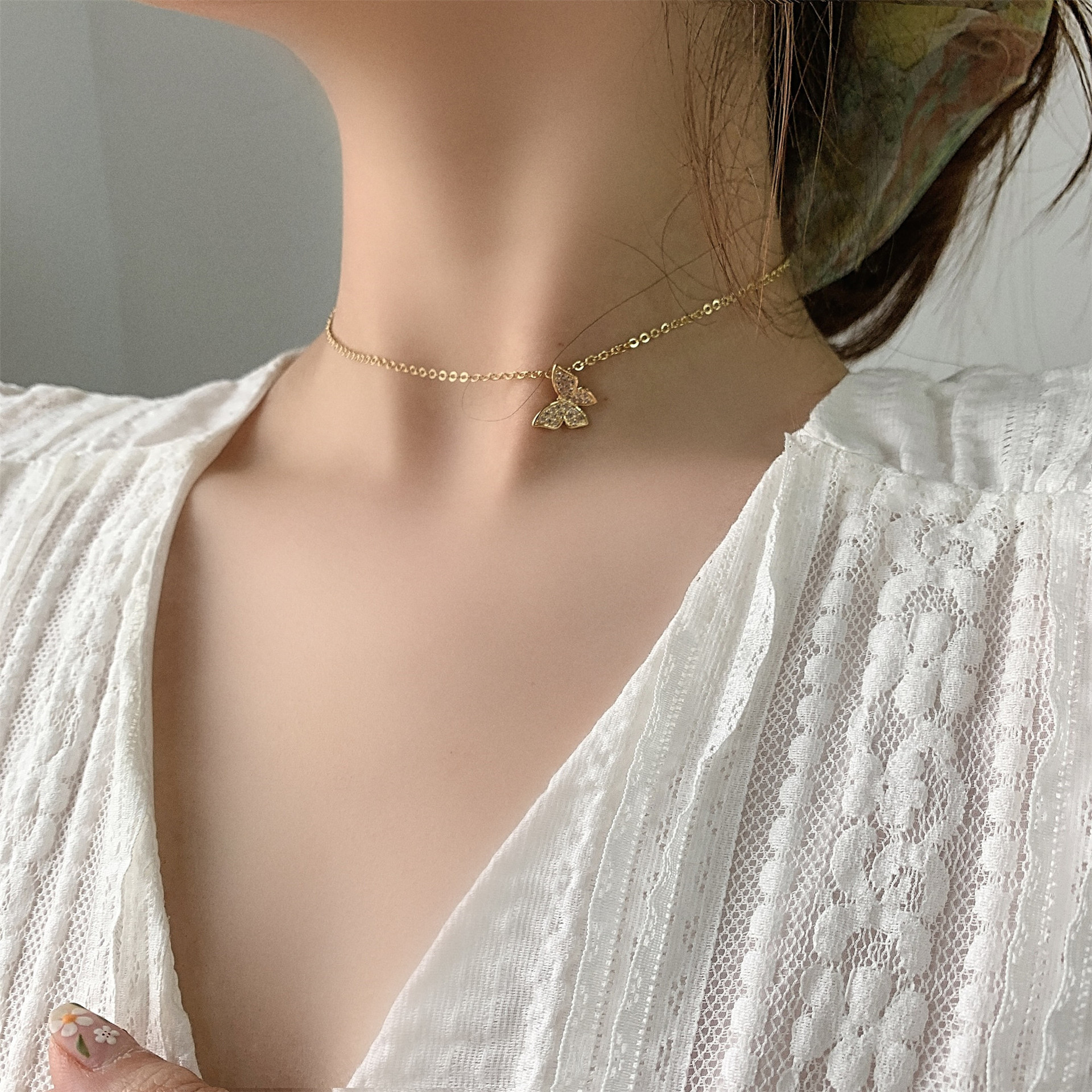 Multi-layered butterfly pearl necklace