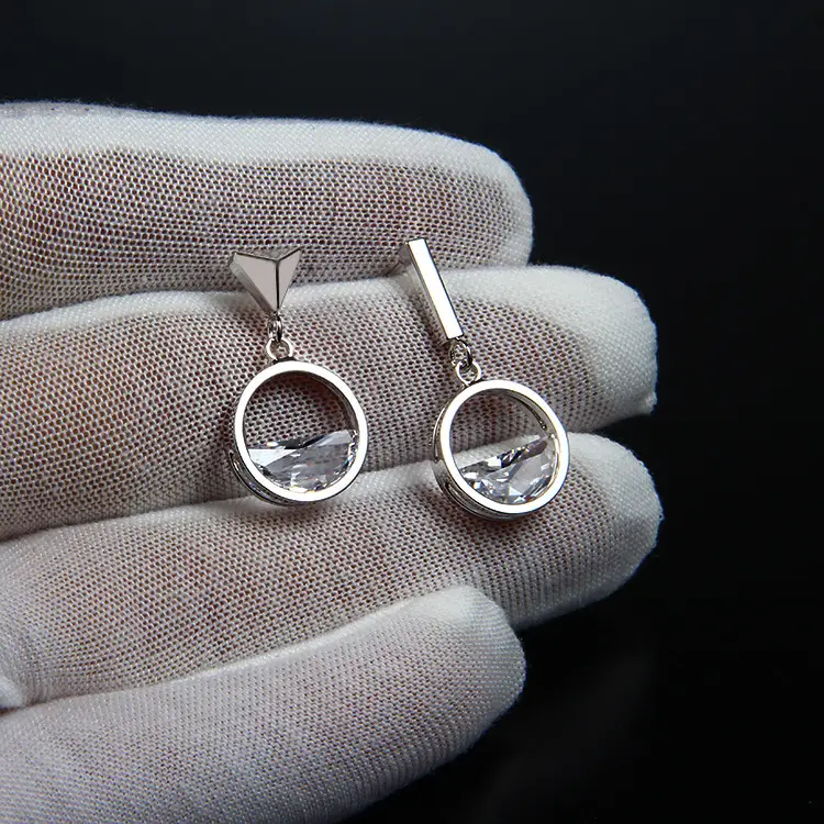 Zircon asymmetrical earrings