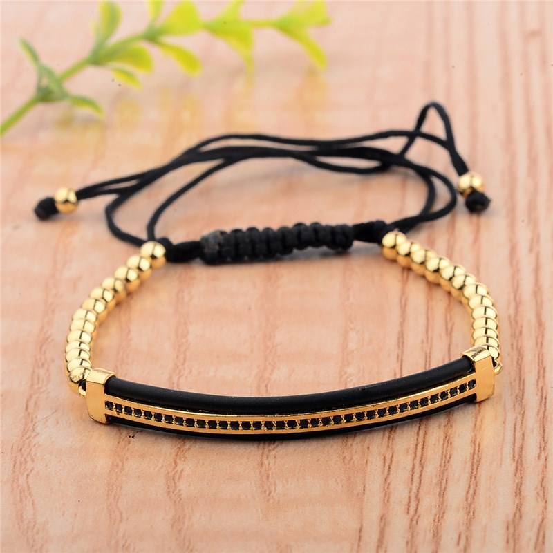 Featured long hand-woven bracelet with black diamonds