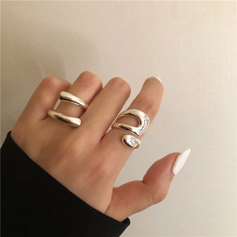 Staggered hollow tide personality irregular curve ring