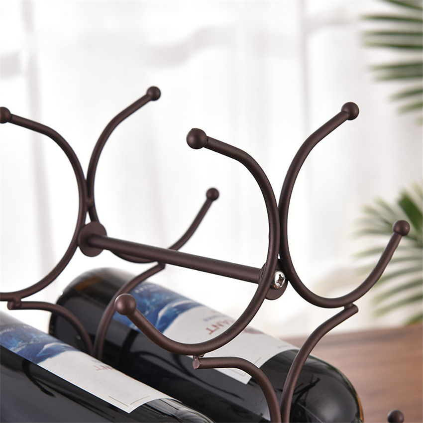 Iron six bottle wine rack in living room