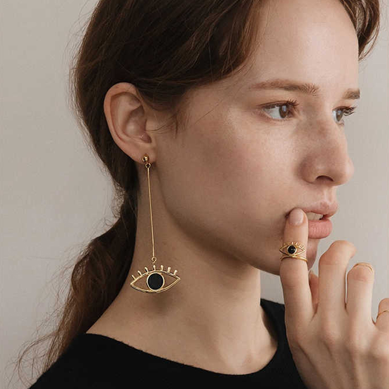 Long cutout eye stud earrings