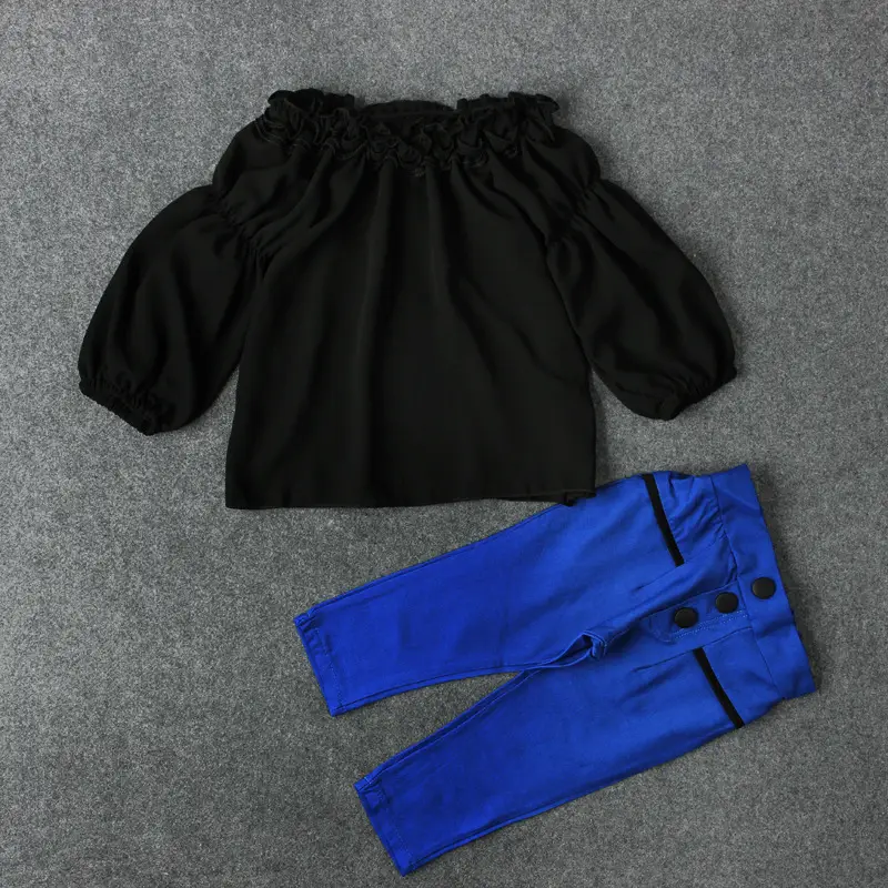 Girl's two-piece blouse and trousers