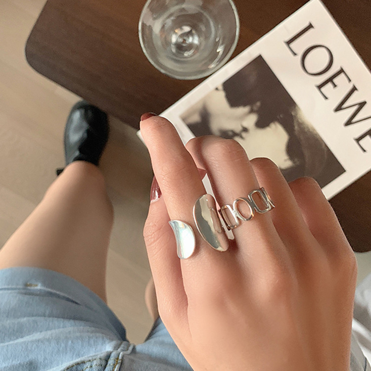 Ring female fashion personality simple silver hollow ring index finger wide version glossy