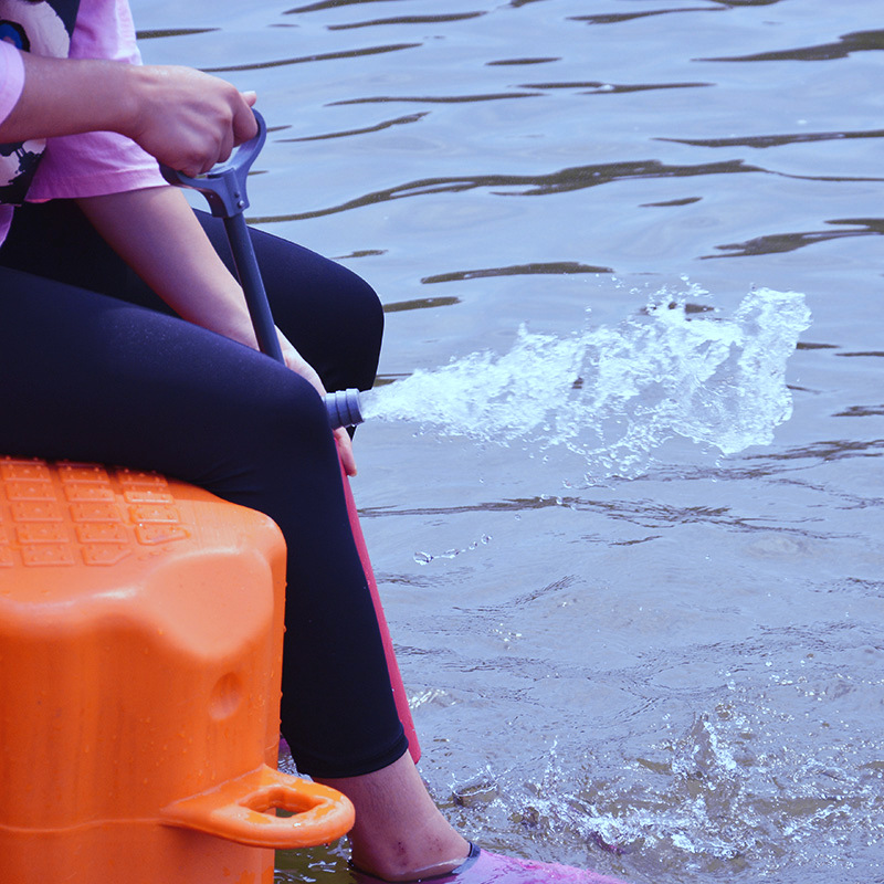 Manual water pump for drainage in the kayak cabin