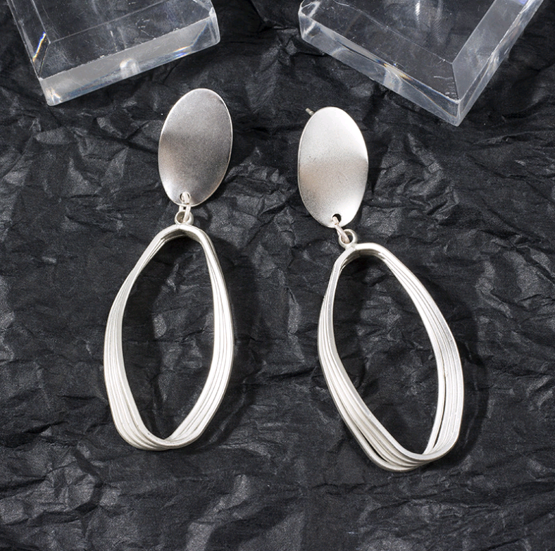 S925 silver needle cold light earrings Europe and the United States long geometric oval earrings simple matte matte earrings female