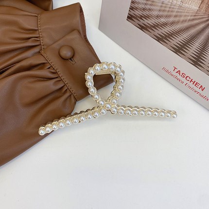 Large pearl hairpins on Instagram