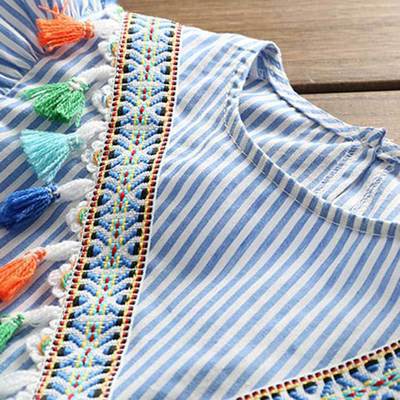 Fringed tunic with wood ears