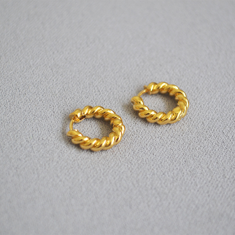 Brass gilded twist round earrings