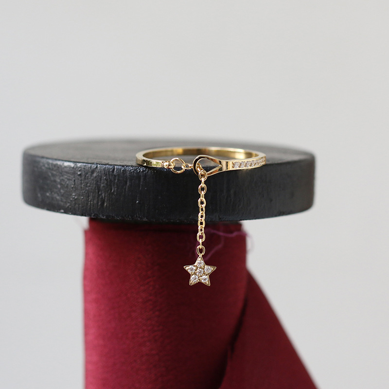 Small five-pointed star ring with tassels