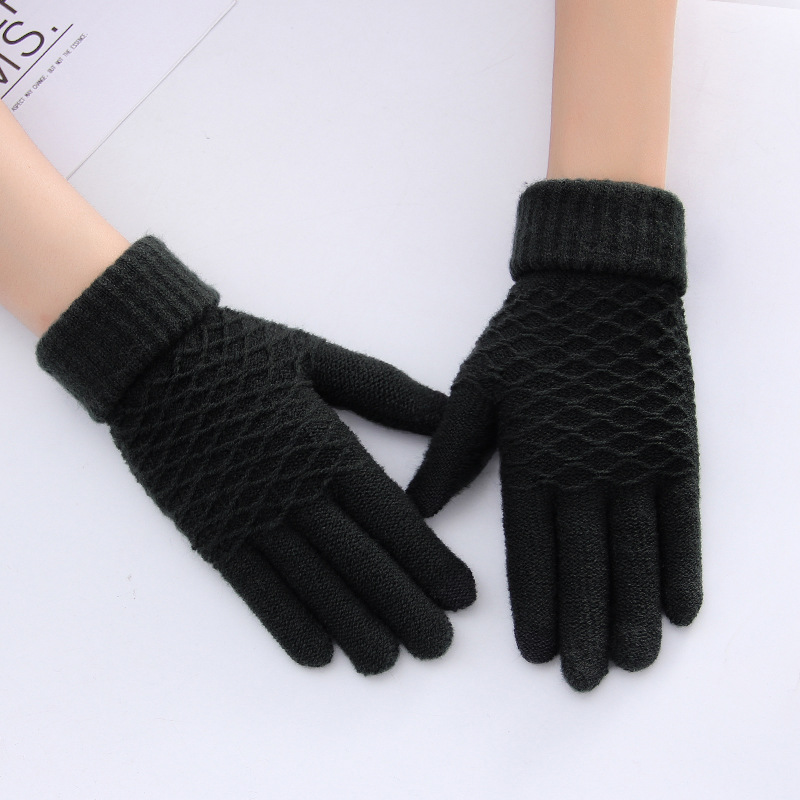 Warm and thick knitted gloves in winter