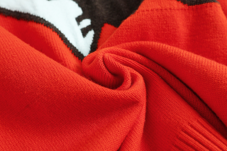 Cute orange dinosaur sweater