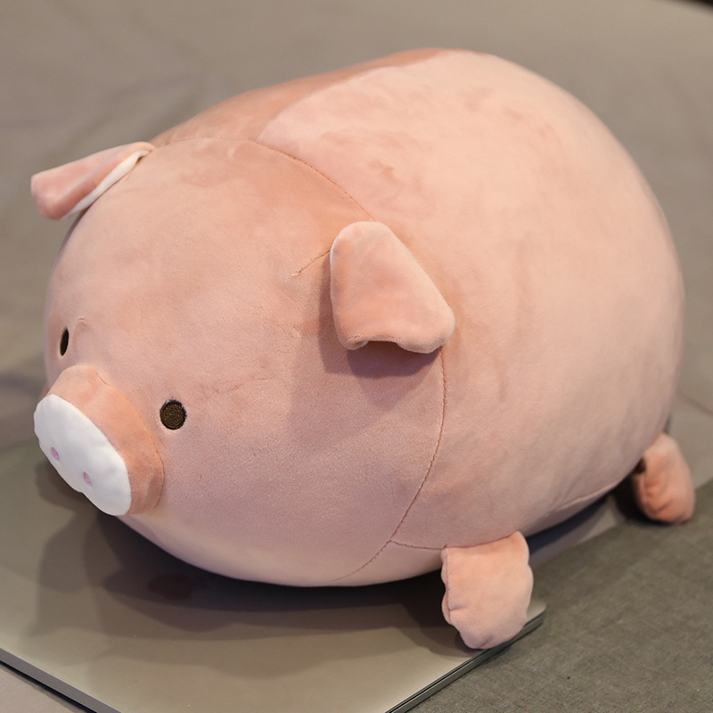 Pink pig lying pillow