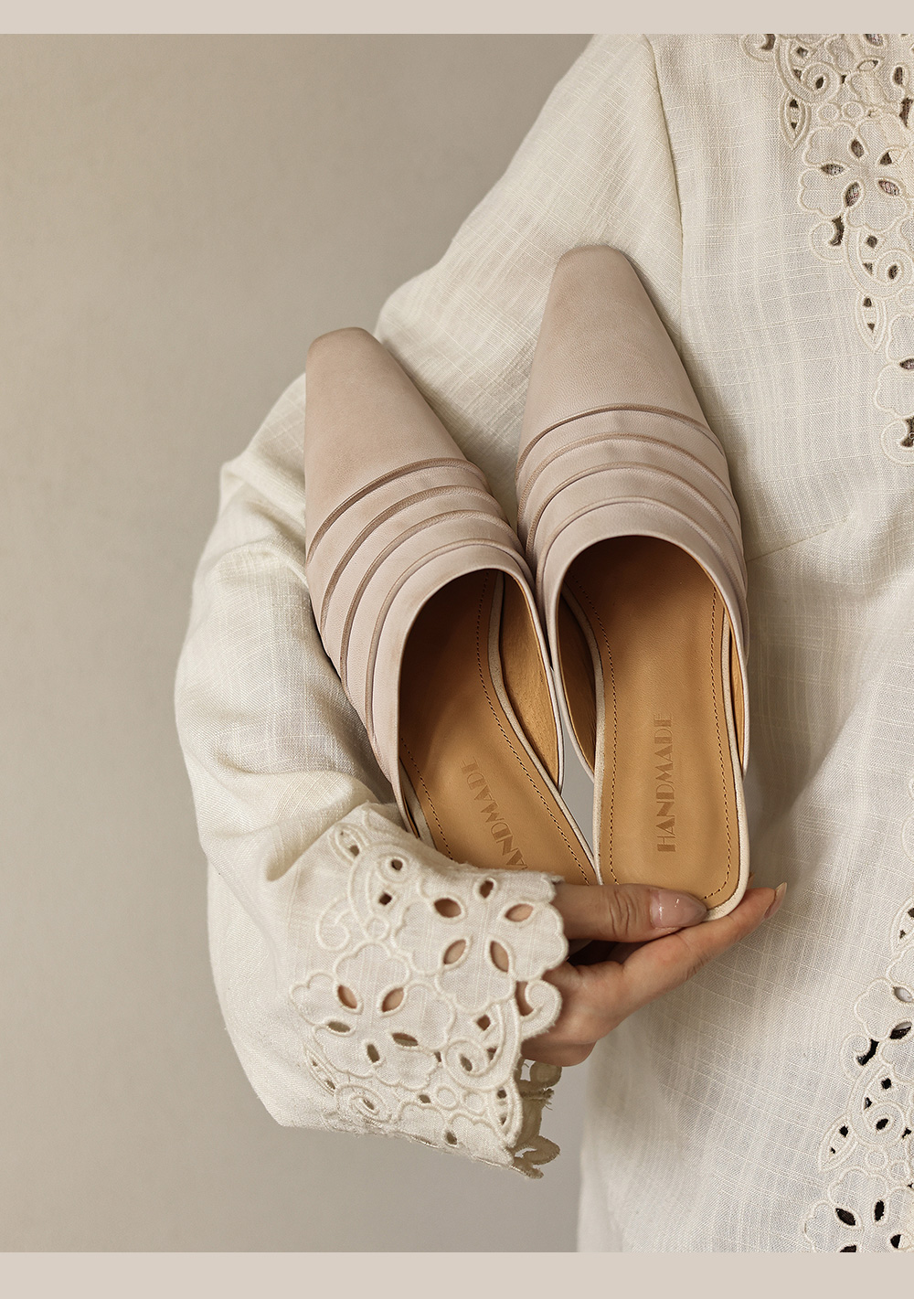 Handmade sheepskin slides in mustard yellow and brown showing color options